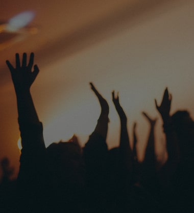 Hands in air in worship of God